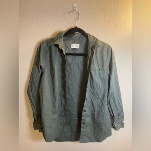 Woman’s long sleeve button up